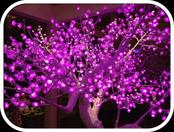 A variation of purple - tree lit up in a shop at the Borgata Casino